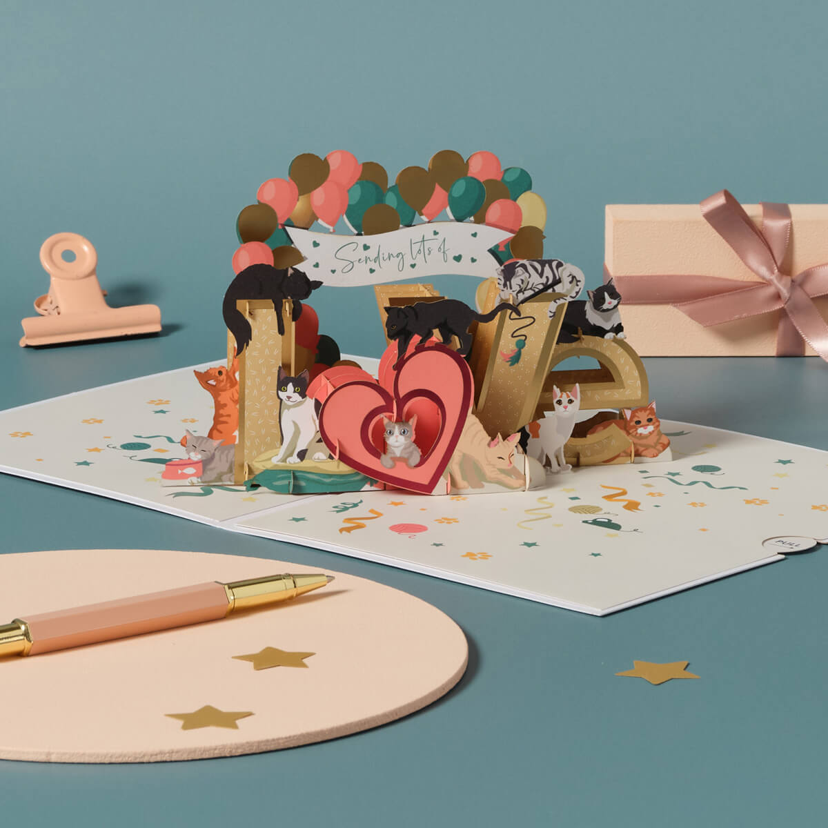 Battersea Cats Love Pop Up Card by Cardology which is perfect for Valentine's Day Cards, Mother's Day Cards, Father's Day Cards or even for Birthday Cards or Anniversary Cards. Pet mum and dad cards. This is a close up image of the Cats Anniversary Pop Up Card for Him or Her