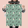 Load image into Gallery viewer, Christmas Battersea Cats Gift Wrapping Paper Set of 4 sheets - image of pattern 1 sheet dimensions which is 50cm x 70cm