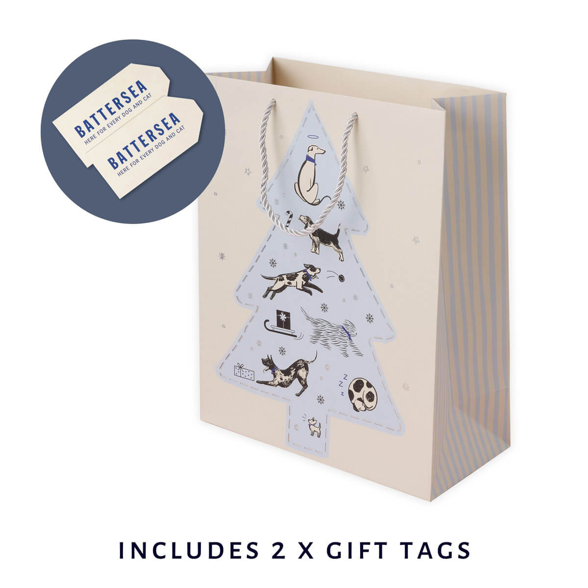 Battersea Dogs & Cats Home Charity Christmas Gift Bag For Dog Lovers - Close up image of christmas gift bag showing black and white illustrations of dogs within a sky blue christmas tree illustration