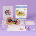 Load image into Gallery viewer, Birthday Cupcakes Pop Up Card by Cardology for Her, Him and Kids - lifestyle image with pop up card open and envelope and notecard