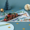 Load image into Gallery viewer, Christmas Train Pop Up Card by Cardology - lifestyle image showing the card open