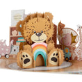 Load image into Gallery viewer, Close up image of gender neutral new baby bear pop up card featuring a 3D teddy bear holding a colourful rainbow and a nursery scene behind the bear,