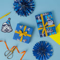 Load image into Gallery viewer, Original Stormtrooper Birthday Gift Wrap Set - lifestyle image showing 2 presents wrapped in each of the pattern designs.