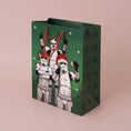 Load image into Gallery viewer, Original Stormtrooper Christmas Gift Bag - Large size - lifestyle image of gift bag