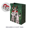 Load image into Gallery viewer, Original Stormtrooper Christmas Gift Bag - Large size - close up image of gift bag which includes 2 x gift tags in the shape of a stormtrooper head with a santa hat on