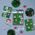 Load image into Gallery viewer, Original Stormtrooper Christmas Gift Wrap Pack of 4 - includes 4 sheets and 4 gift tags - lifestyle image of christmas wrapping paper