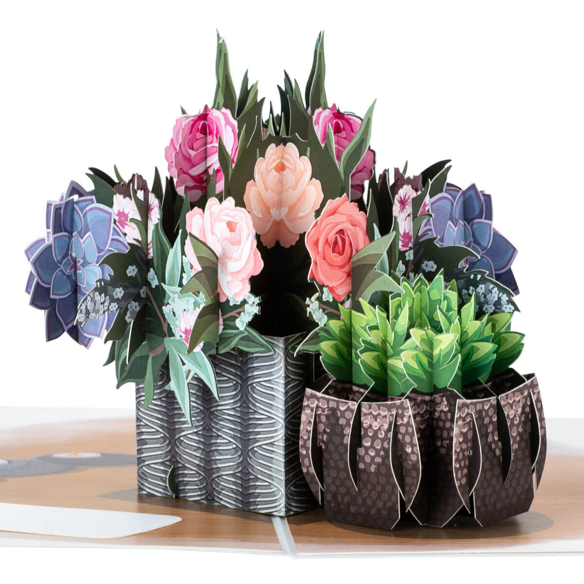 Peonies Pop Up Card by Cardology - Image shows close up of the card which shows a pop up table arrangement of beautiful peonies and a succulent in 3D form.