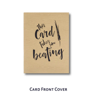Card front cover with text 'This Card takes some beating' on a wooden texture background