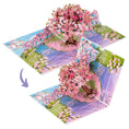Load image into Gallery viewer, Pink Cherryblossom Tree Pop Up Card perfect for Birthday cards, Mothers Day Cards, Anniversary Cards, Valentines Day and more. This image shows the pop up card closing