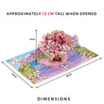 Load image into Gallery viewer, Pink Cherryblossom Tree Pop Up Card perfect for Birthday cards, Mothers Day Cards, Anniversary Cards, Valentines Day and more.  This image shows the dimensions of the card which when opened are 30cm (l) x 20cm (w) and approximately 12cm (h)