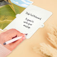 Load image into Gallery viewer, Vintage Steam Train Pop Up Card inspired by the Flying Scotsman and perfect for all occasions including Father's Day. This image shows the slide out notecard which gives a space to write your personal message without without compromising the inside pop-up design. It's a thoughtful addition that adds a personal touch and preserves the beauty of the card.