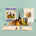 Load image into Gallery viewer, 3D Wine and Cheese Pop Up Card for Birthdays, Mothers Day or Fathers Day - image showing card open with packaging, envelope and notecard
