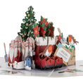 Load image into Gallery viewer, Winter Wellies Pop Up Card for gardening lovers - close up image of 3D card with santa boots filled with poinsettia and robins.