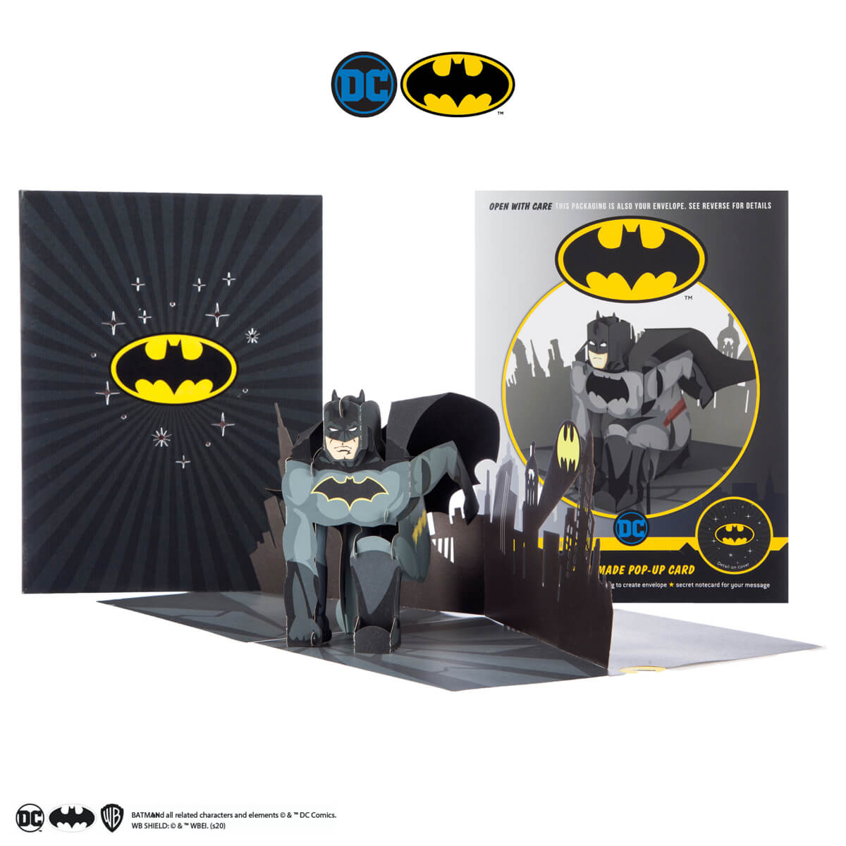Batman Pop Up Card Fully Open with Cover and Packaging behind - photographed on a white background