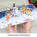 Load image into Gallery viewer, lifestyle image of Winter Woodland Pop Up Card being held open