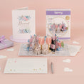 Load image into Gallery viewer, Diamond Wedding Anniversary Card for 60th Wedding Anniversary Gift - lifestyle image of 60th wedding anniversary card with notecard and reversible packaging which converts into a gifting envelope