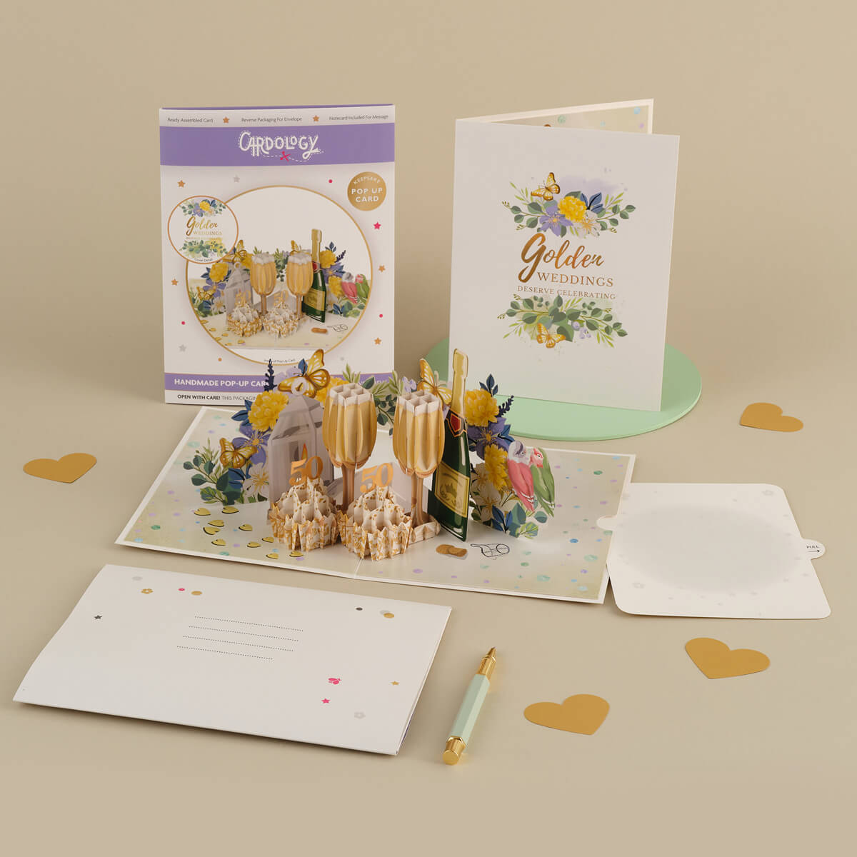 Golden Wedding Anniversary Card for a 50th Wedding Anniversary Gift - lifestyle image of 50th wedding anniversary card close up with notecard and gifting envelope
