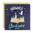 Load image into Gallery viewer, Blue Harry Potter Christmas Card which reads 'I'd Rather Stay At Hogwarts This Christmas' - image taken on a white backdrop