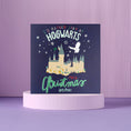 Load image into Gallery viewer, Blue Harry Potter Christmas Card which reads 'I'd Rather Stay At Hogwarts This Christmas' - image taken on a purple lifestyle backdrop