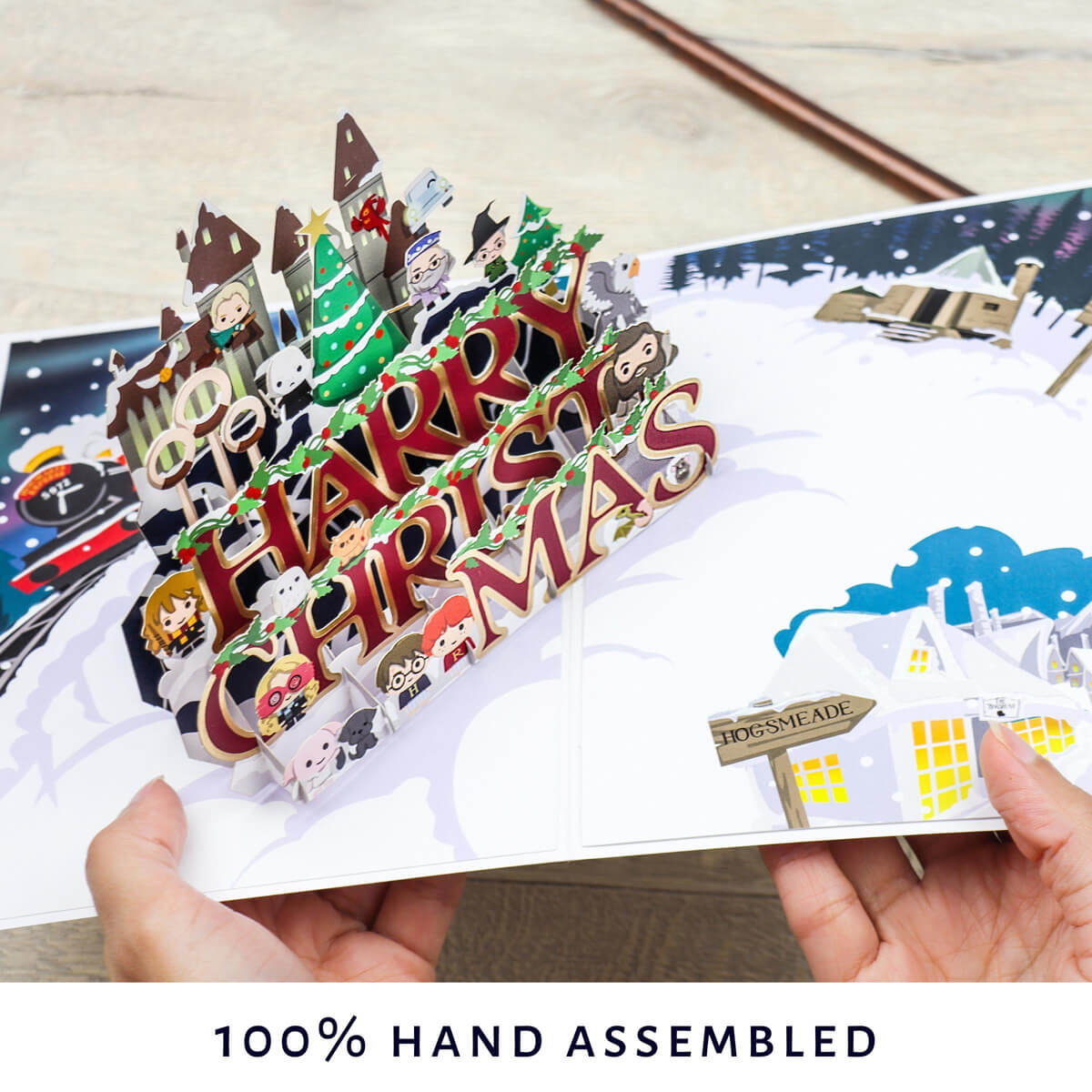 Harry Potter Christmas Pop Up Card  - Image of hands holding the card open