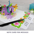 Load image into Gallery viewer, lifestyle image showing 40th birthday pop up card slide out notecard to write message on