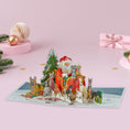 Load image into Gallery viewer, Pop-up Christmas card with Santa Claus and dogs on a pink background
