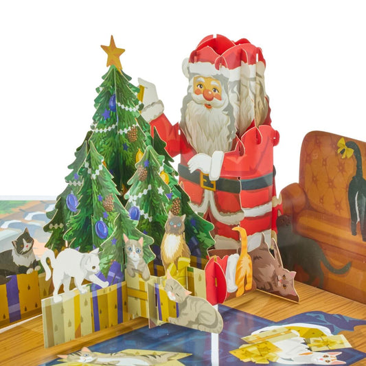3D charity Santa Cat pop-up Christmas card fully opened featuring santa next to a christmas tree surrounded by lots of cats.