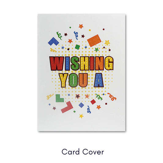 Birthday Bricks Pop Up Card for kids and adults who like building with Lego. Close up image of the card front cover which says 'Wishing You A' in building blocks