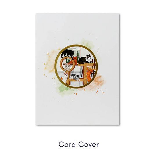 Image of Cat Tree Pop Up Card cover which features a circular graphic image of the cat tree card in the center of the white card
