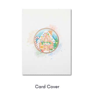 Front of Christmas card featuring festive gingerbread house illustration on cream cardstock
