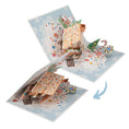 Load image into Gallery viewer, Pop-up card with gingerbread house and candy cane design on a white background. Image shows the card closing
