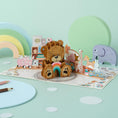 Load image into Gallery viewer, Image of Cardology New Baby Bear Pop Up Card which is also perfect as a first birthday card and gift.  Image shows card fully open
