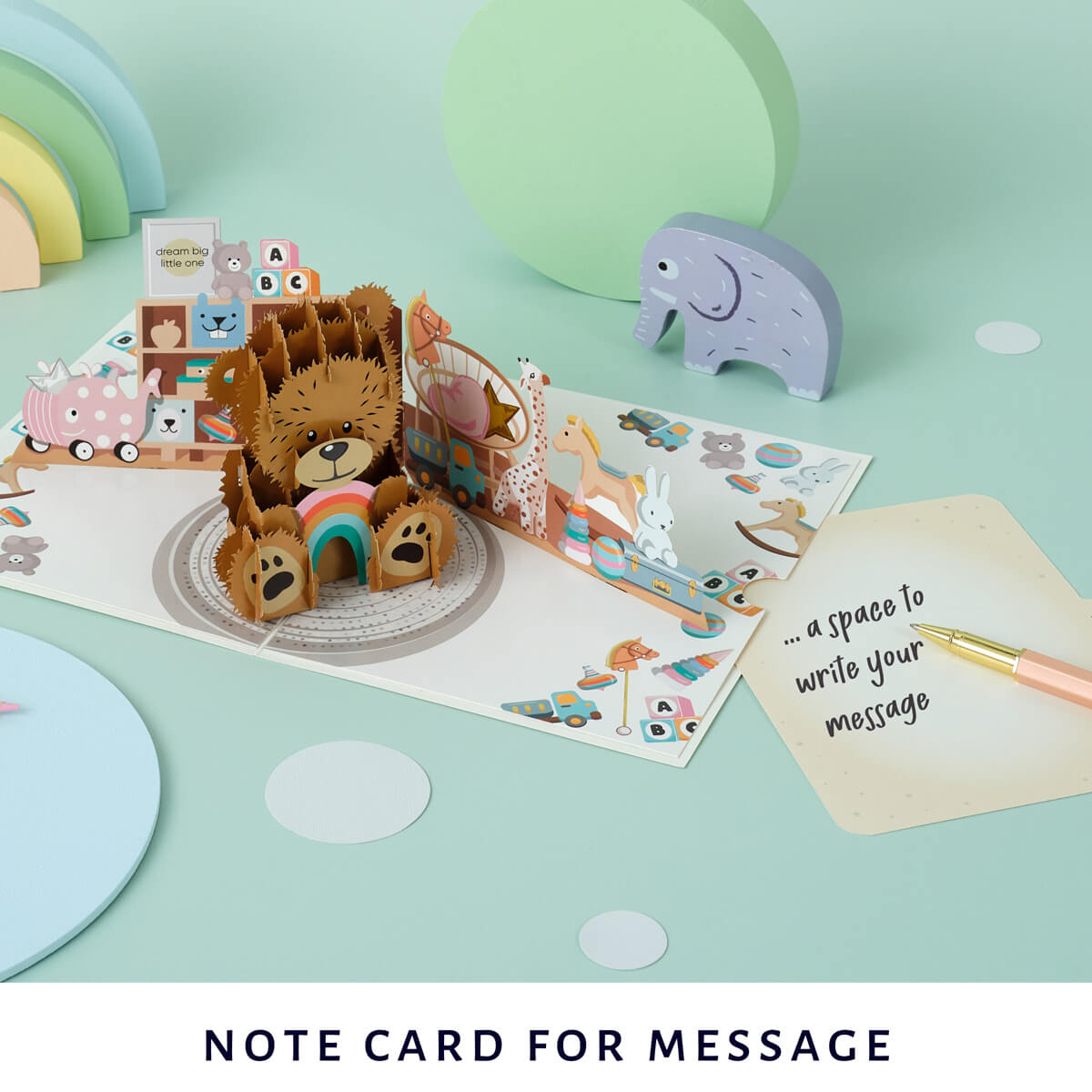 Image of Cardology New Baby Bear Pop Up Card which highlights the slide out notecard which is a space for you to write your personal message without ruining the aesthetic of the card