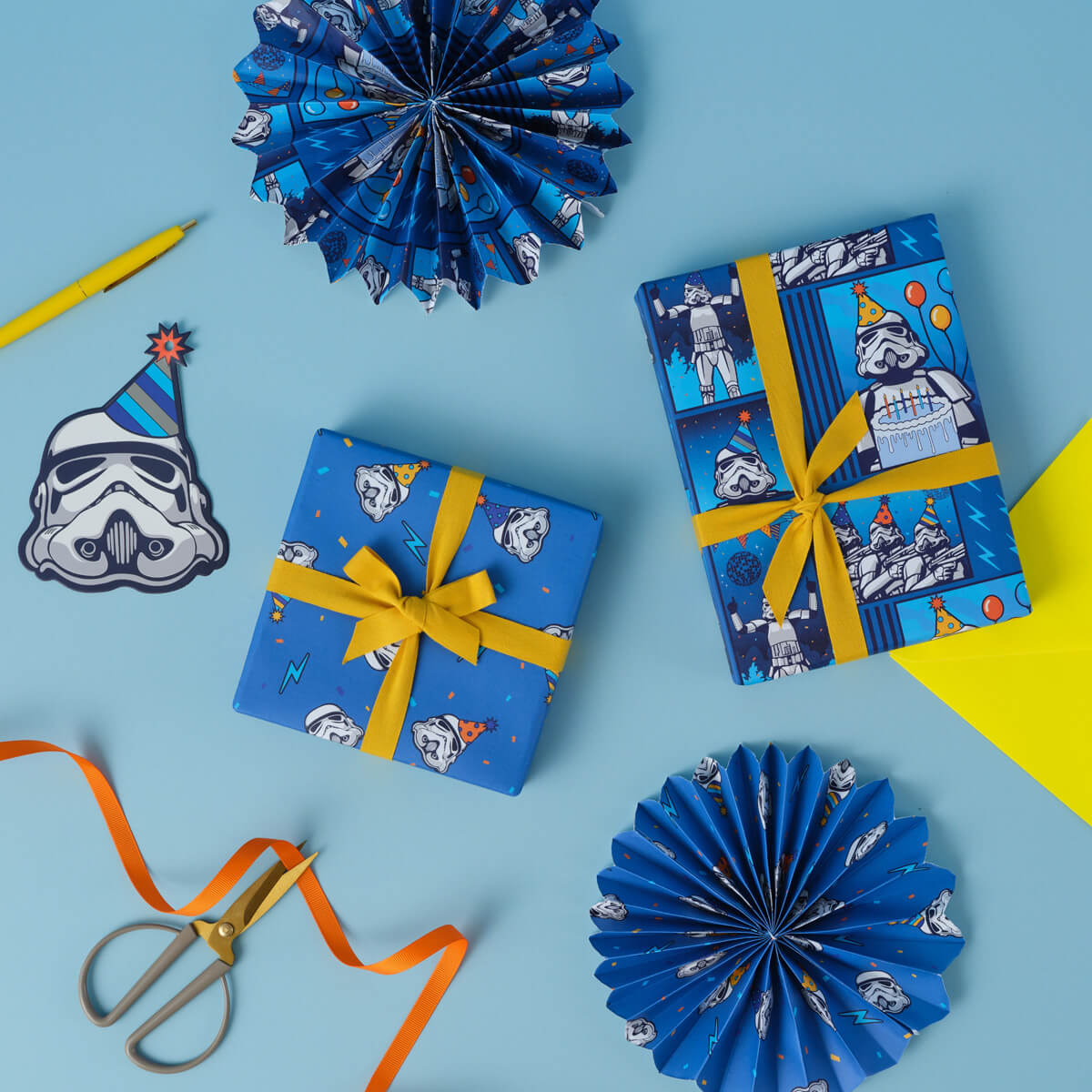 Original Stormtrooper Birthday Gift Wrap Set - lifestyle image showing 2 presents wrapped in each of the pattern designs.