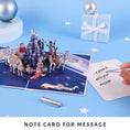 Load image into Gallery viewer, Original Stormtrooper Christmas Pop Up Card for Star Wars fans - image showing the pull out notecard which gives a personal space to write a message to the recipient without ruining the aesthetic of the card
