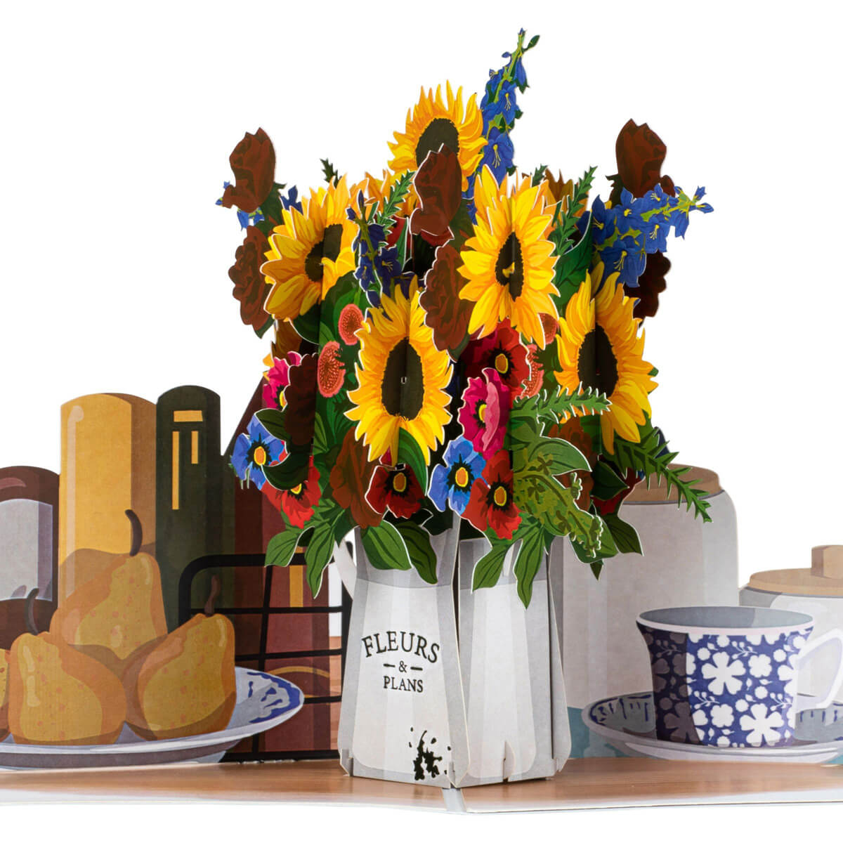 Sunflowers Pop Up Card by Cardology which is perfect for Birthdays, Mothers Day, Anniversaries or even New Home Congratulations. This image is a close up of the pop up which is a beautiful 3D flower arrangement of sunflowers in a vase sitting on a kitchen table top.