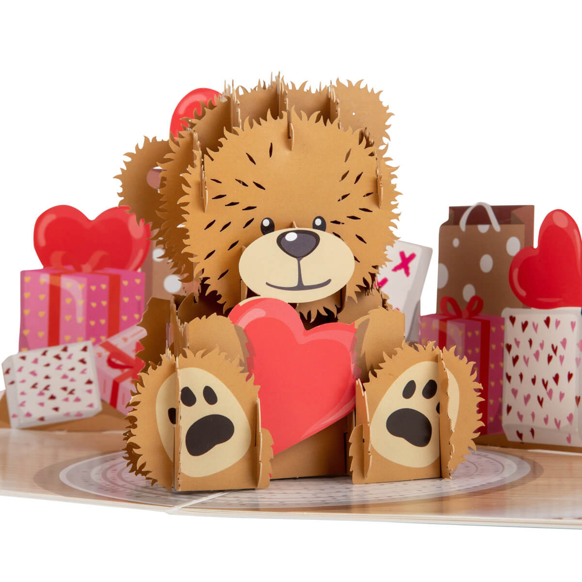 Close up image of Cardology Valentines Day Card or Anniversary Card.  Love Bear Pop Up Card featuring a 3D teddy bear holding a red heart.