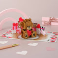 Load image into Gallery viewer, Image of Love Bear Pop Up Card fully open.  This card is perfect for Valentine's Day Cards or Anniversary Cards, including for a first anniversary
