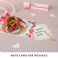 Load image into Gallery viewer, Image of Love Bear Pop Up Card slide out notecard which provides a space to write a heartfelt message without ruining the aesthetic of the card
