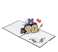 Load image into Gallery viewer, Image of 90th Birthday Card for men and women, fully open at 180 degrees on a white surface
