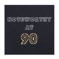 Load image into Gallery viewer, Close up image of 90th Birthday Pop Up Card black cover which reads "Noteworthy at 90"
