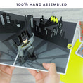 Load image into Gallery viewer, Batman Pop UP Card Image With Hands Holding The Card Open
