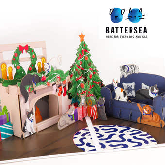 Battersea Charity Christmas Pop Up Card For Cat Lovers. Pop Up Christmas Tree, Sofa and Fireplace, surrounded by cats