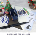 Load image into Gallery viewer, image of battersea cats card showing slide out notecard which gives you a space to write your message
