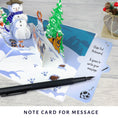 Load image into Gallery viewer, Image of Battersea Dogs Christmas Card slide out notecard which gives a space to write the message
