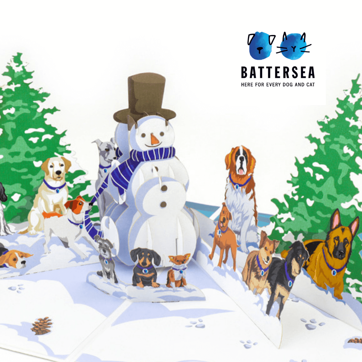 close up image of Battersea Dogs Christmas Charity 3D Card featuring a 3D snowman surround by different dog breeds in the snow