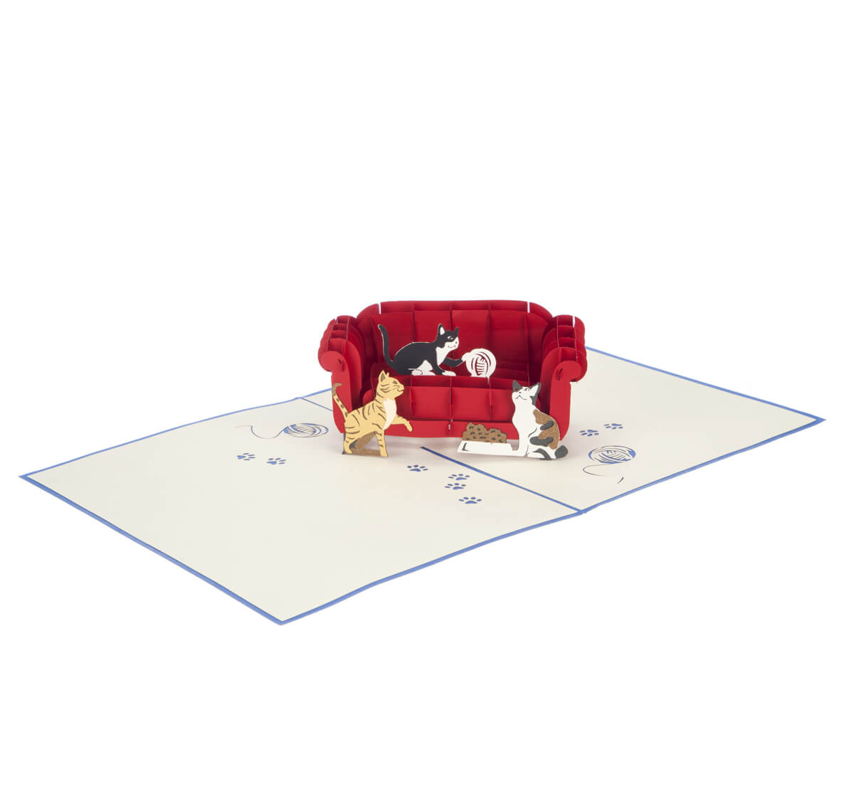 Close up image of "Cats On A Sofa" pop up card featuring a 3D red sofa with 3 kittens playing on it, fully open at 180 degrees.