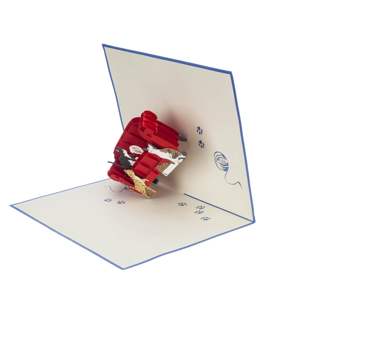 Image of "Cats On A Sofa" pop up card featuring a 3D red sofa with 3 kittens playing on it, half open at 90 degree angle