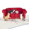 Load image into Gallery viewer, Close up image of "Cats On A Sofa" pop up card featuring a 3D red sofa with 3 kittens playing on it.
