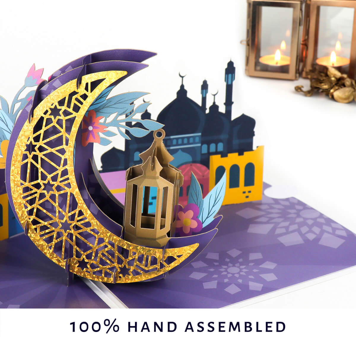 close up lifestyle image of eid card with text '100% Hand Assembled'